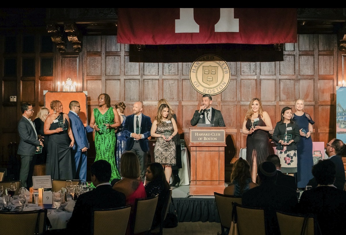Richie Hosein on stage with healthcare leaders at the Harvard Club of Boston
